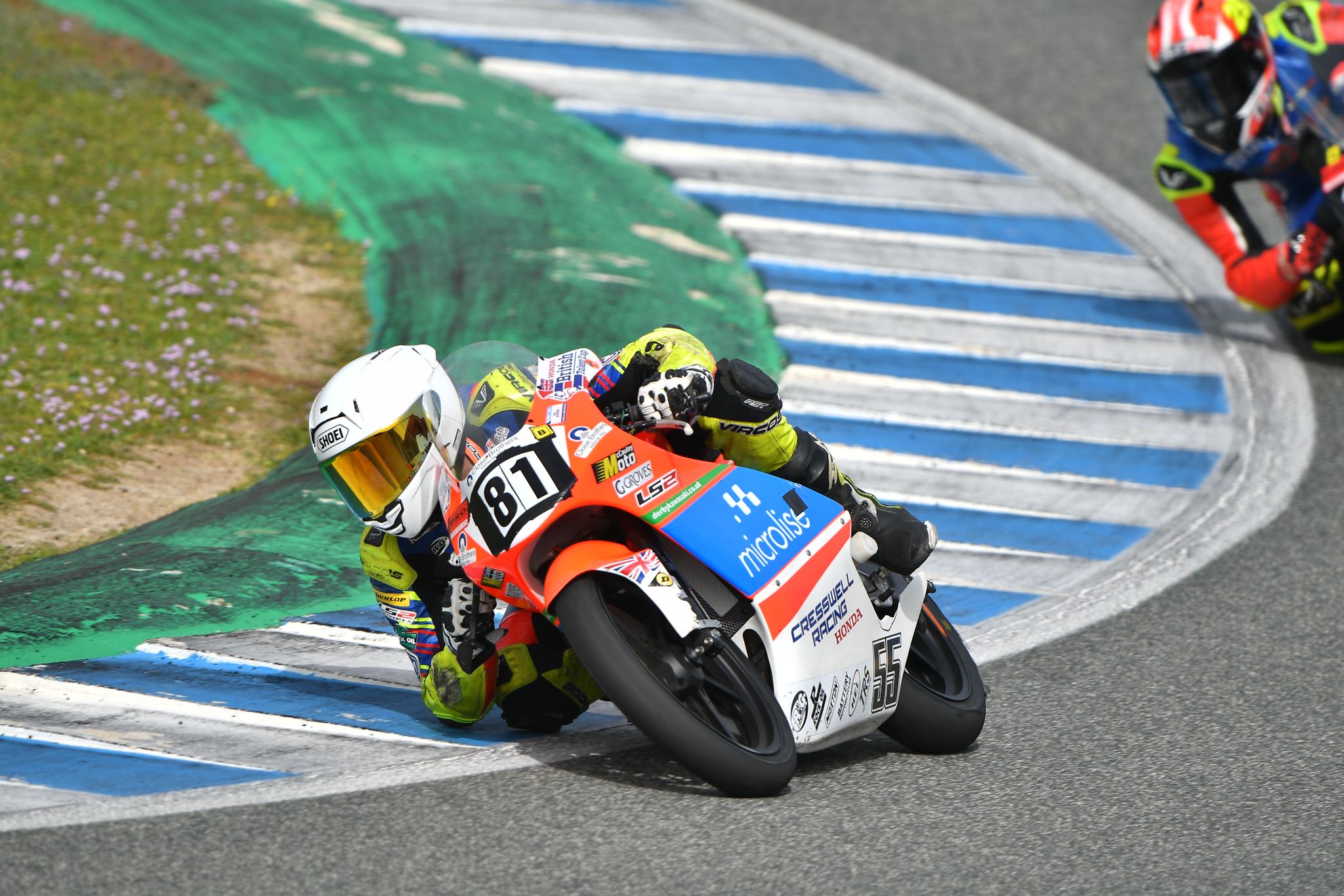 Motorcyclist Harrison Dessoy corners followed by another rider